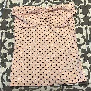 Pink and black polka dot strapless top